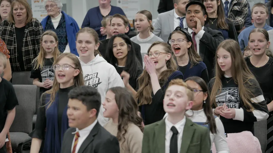 Children cheering and shouting during a game